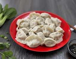 Пельмени со свининой и пекинской капустой варёные